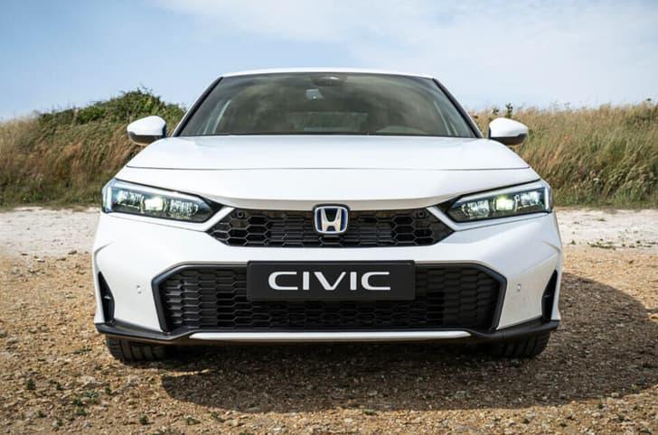 Image: Civic Hatchback side profile
Alt Text: 2025 Honda Civic Hatchback profile showing sporty design